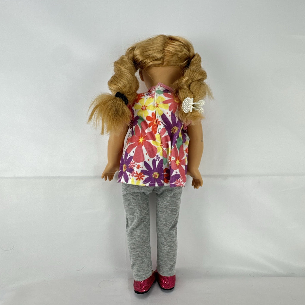 Lovee Doll & Toy Co. 18-inch girl doll with blonde braids, blue eyes, floral top, and pink glitter flats