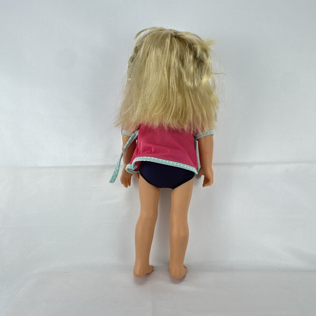 Adora 18-inch blonde doll with blue eyes wearing a navy swimsuit and pink polka dot hooded cover-up