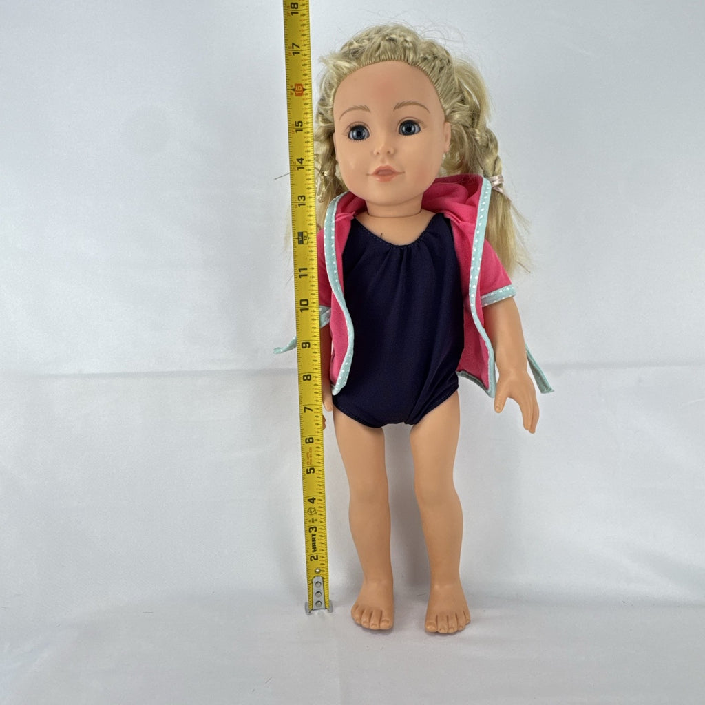 Adora 18-inch blonde doll with blue eyes wearing a navy swimsuit and pink polka dot hooded cover-up