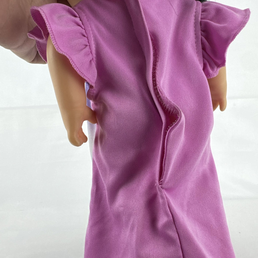 Hasbro Baby Alive 12-inch doll with black pigtails wearing a colorful Disney Vampirina dress