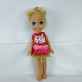 Mattel Barbie 14-inch blonde toddler play doll wearing a watermelon dress with green trim