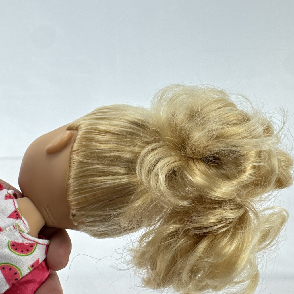 Mattel Barbie 14-inch blonde toddler play doll wearing a watermelon dress with green trim