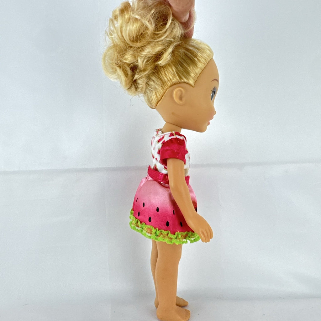 Mattel Barbie 14-inch blonde toddler play doll wearing a watermelon dress with green trim