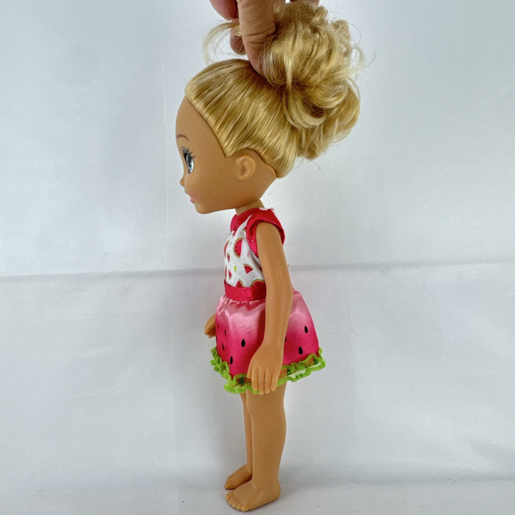 Mattel Barbie 14-inch blonde toddler play doll wearing a watermelon dress with green trim