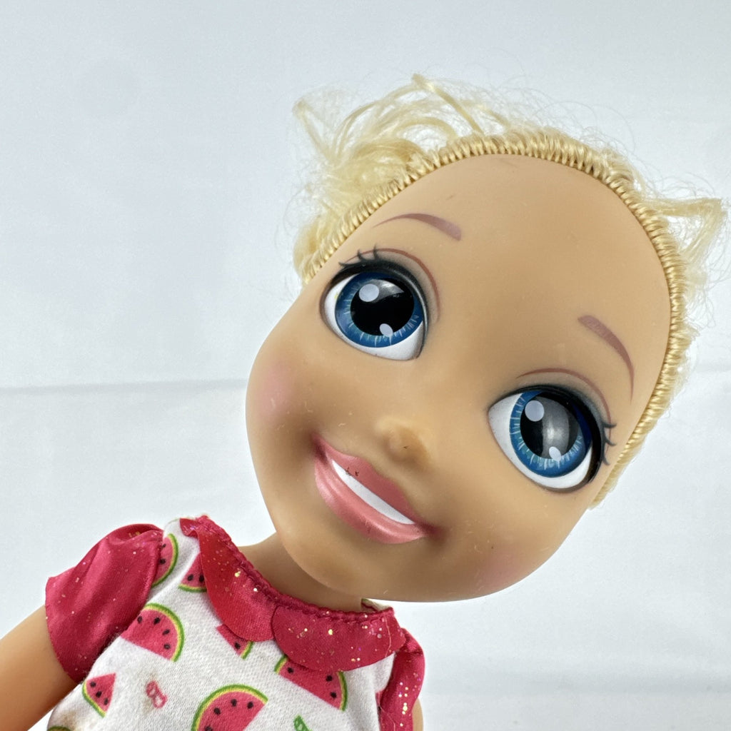 Mattel Barbie 14-inch blonde toddler play doll wearing a watermelon dress with green trim