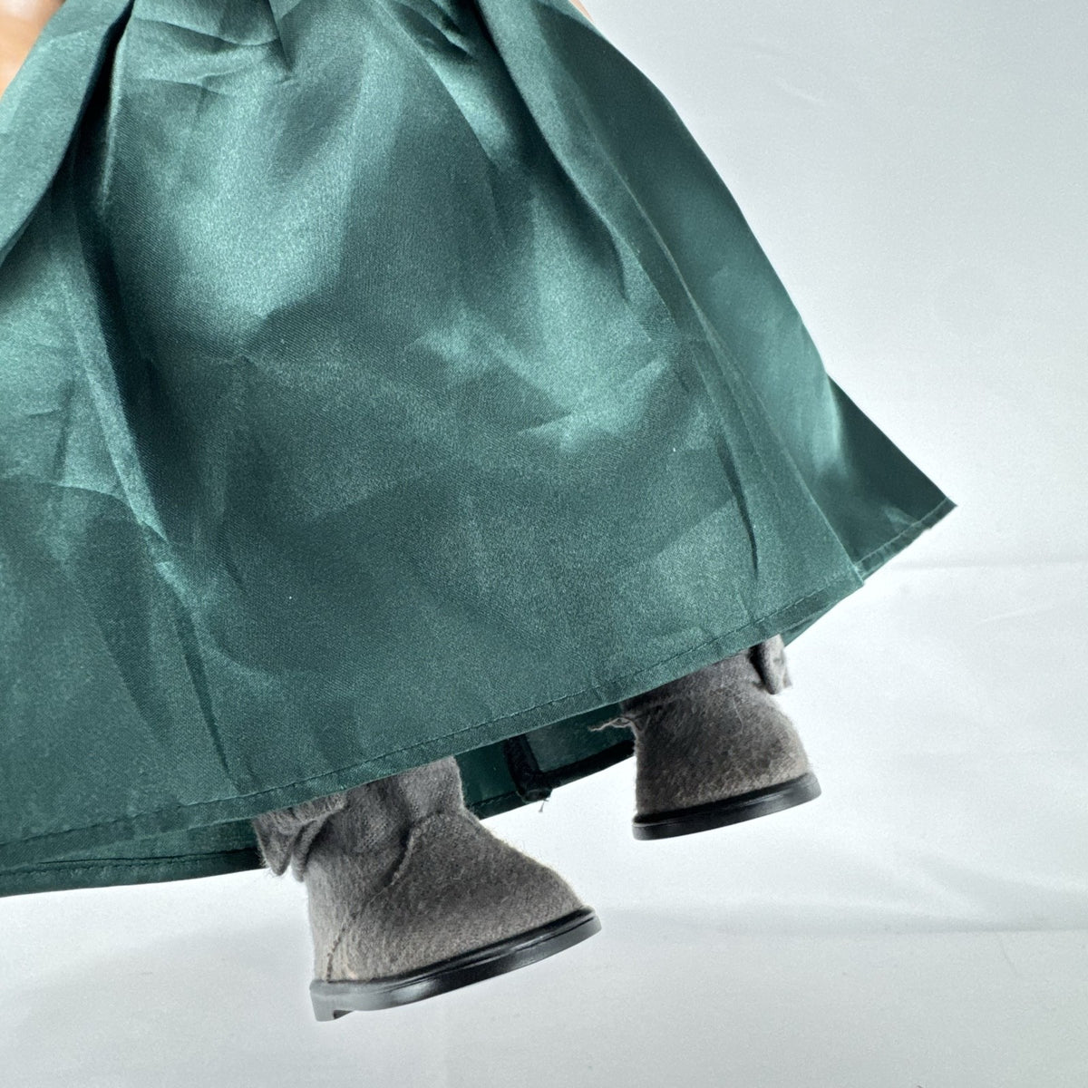 Battat Our Generation 18-inch blonde play doll wearing a green coronation dress and grey shoes