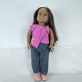 Our Generation 18-inch African American doll in pink wrap top and denim pants with long dark brown hair