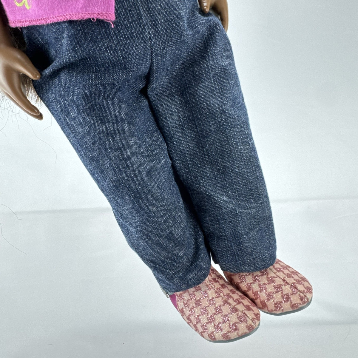 Our Generation 18-inch African American doll in pink wrap top and denim pants with long dark brown hair
