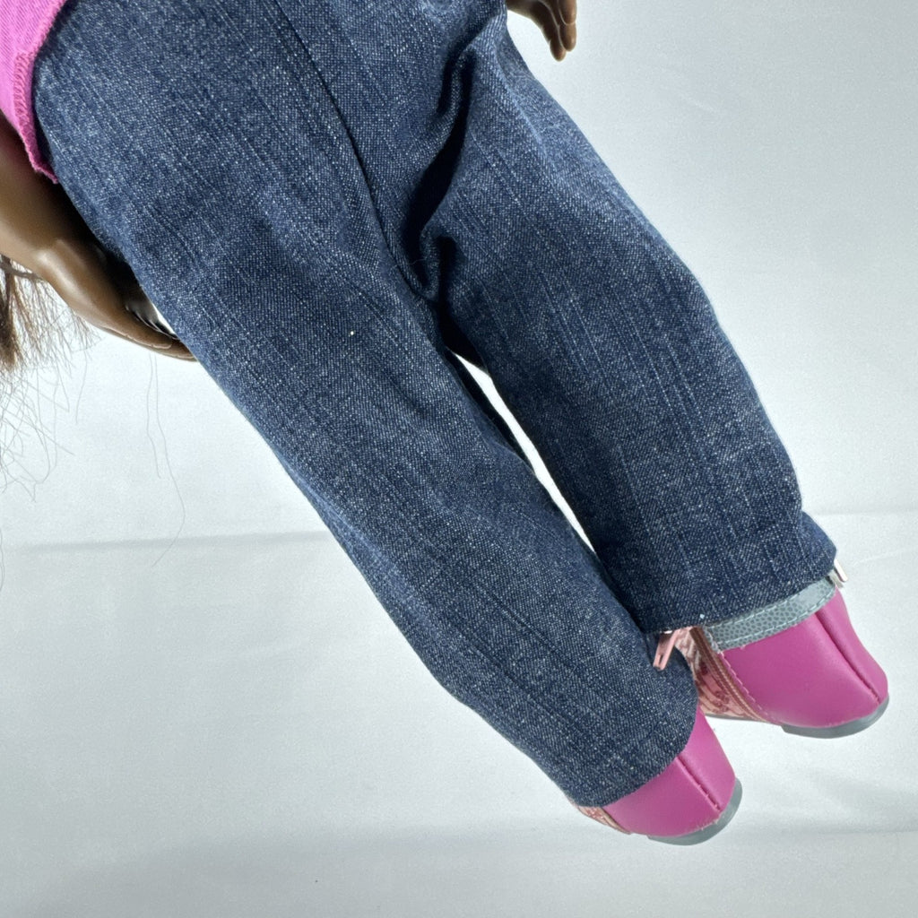 Our Generation 18-inch African American doll in pink wrap top and denim pants with long dark brown hair