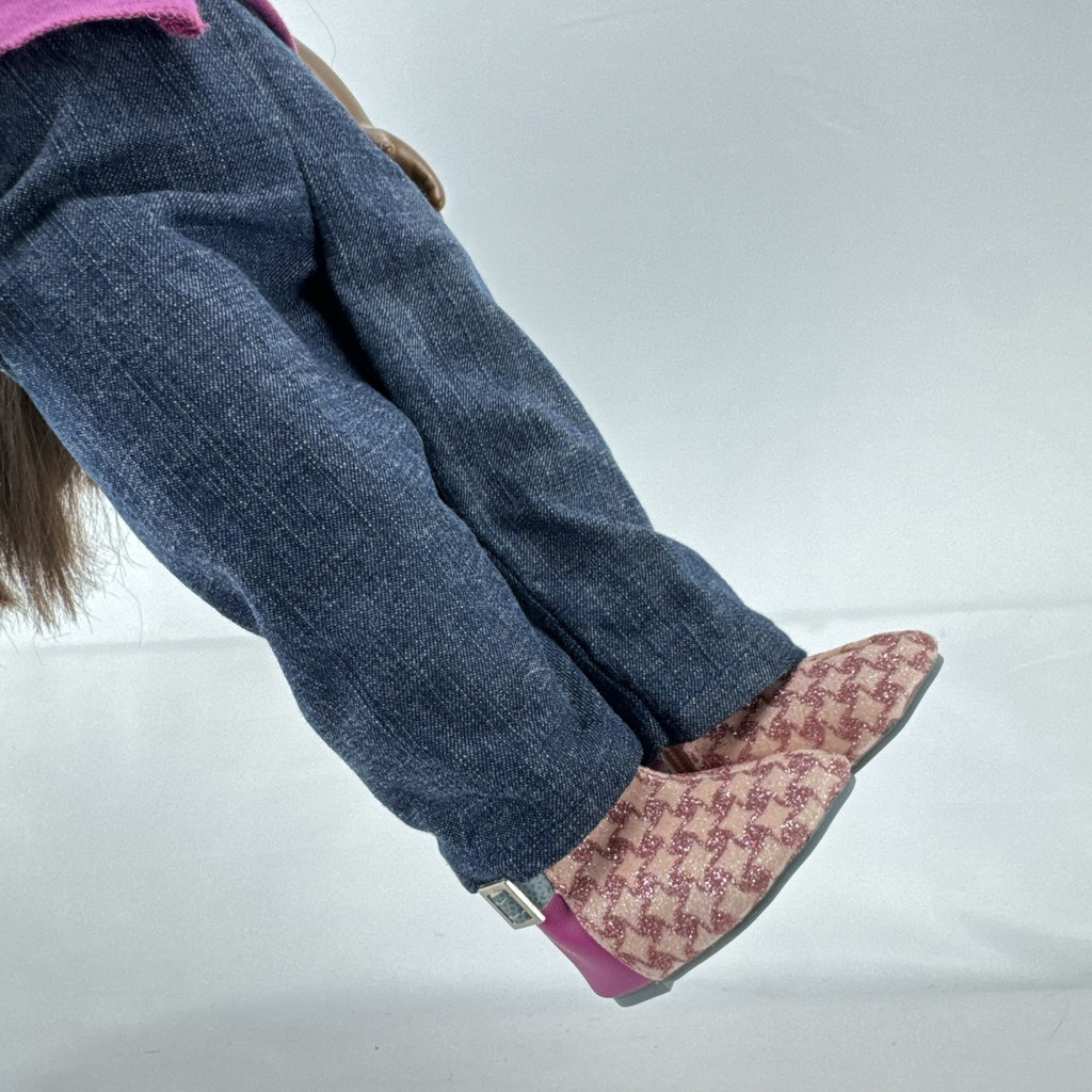 Our Generation 18-inch African American doll in pink wrap top and denim pants with long dark brown hair