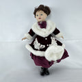 The Brass Key 15-inch Victorian porcelain doll in burgundy velvet winter coat with white faux fur trim and muff