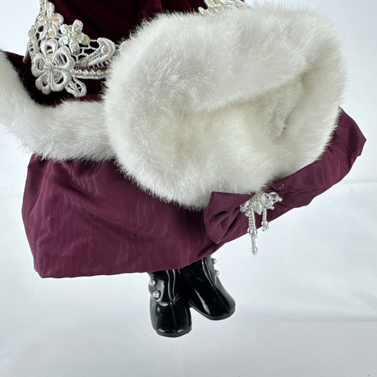 The Brass Key 15-inch Victorian porcelain doll in burgundy velvet winter coat with white faux fur trim and muff