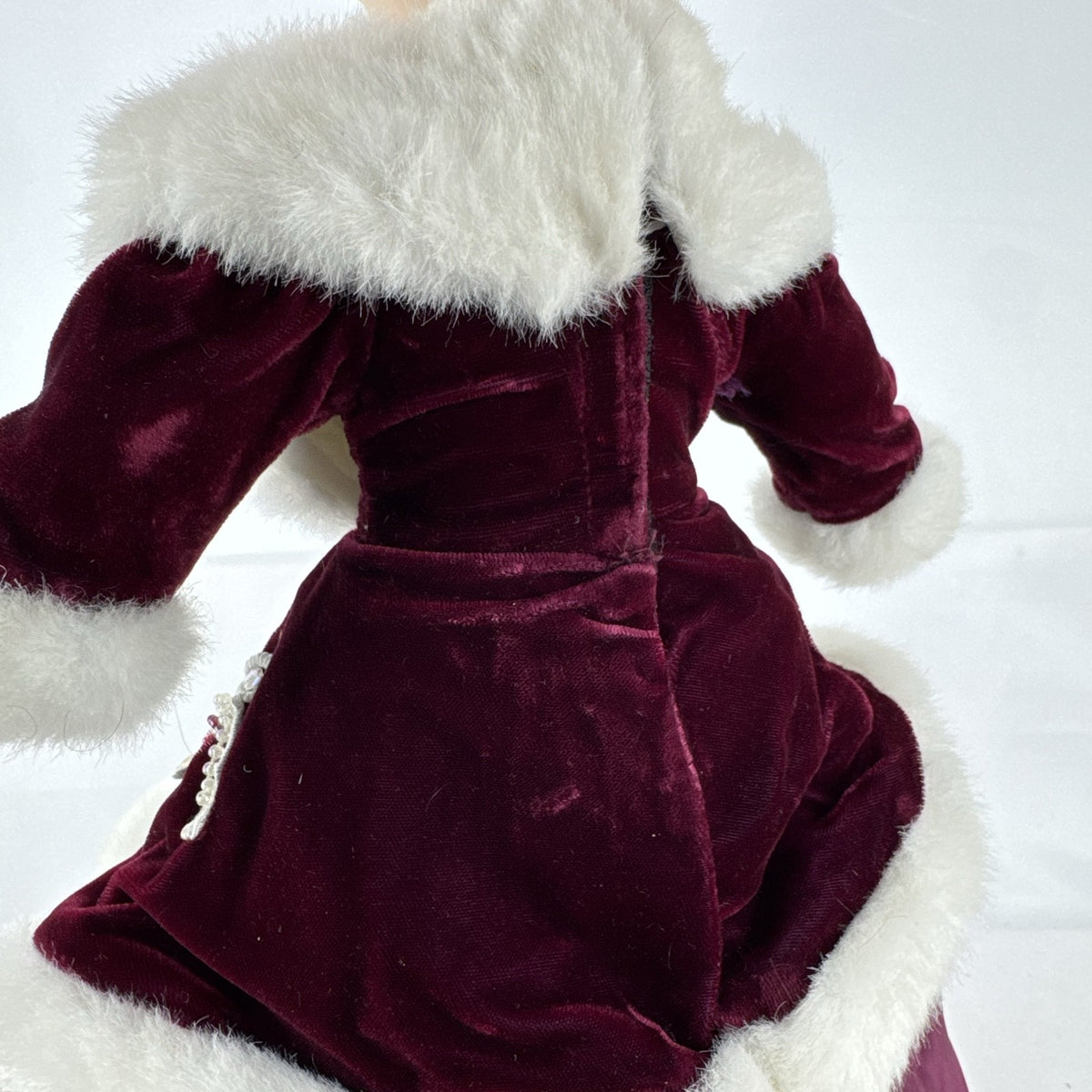 The Brass Key 15-inch Victorian porcelain doll in burgundy velvet winter coat with white faux fur trim and muff