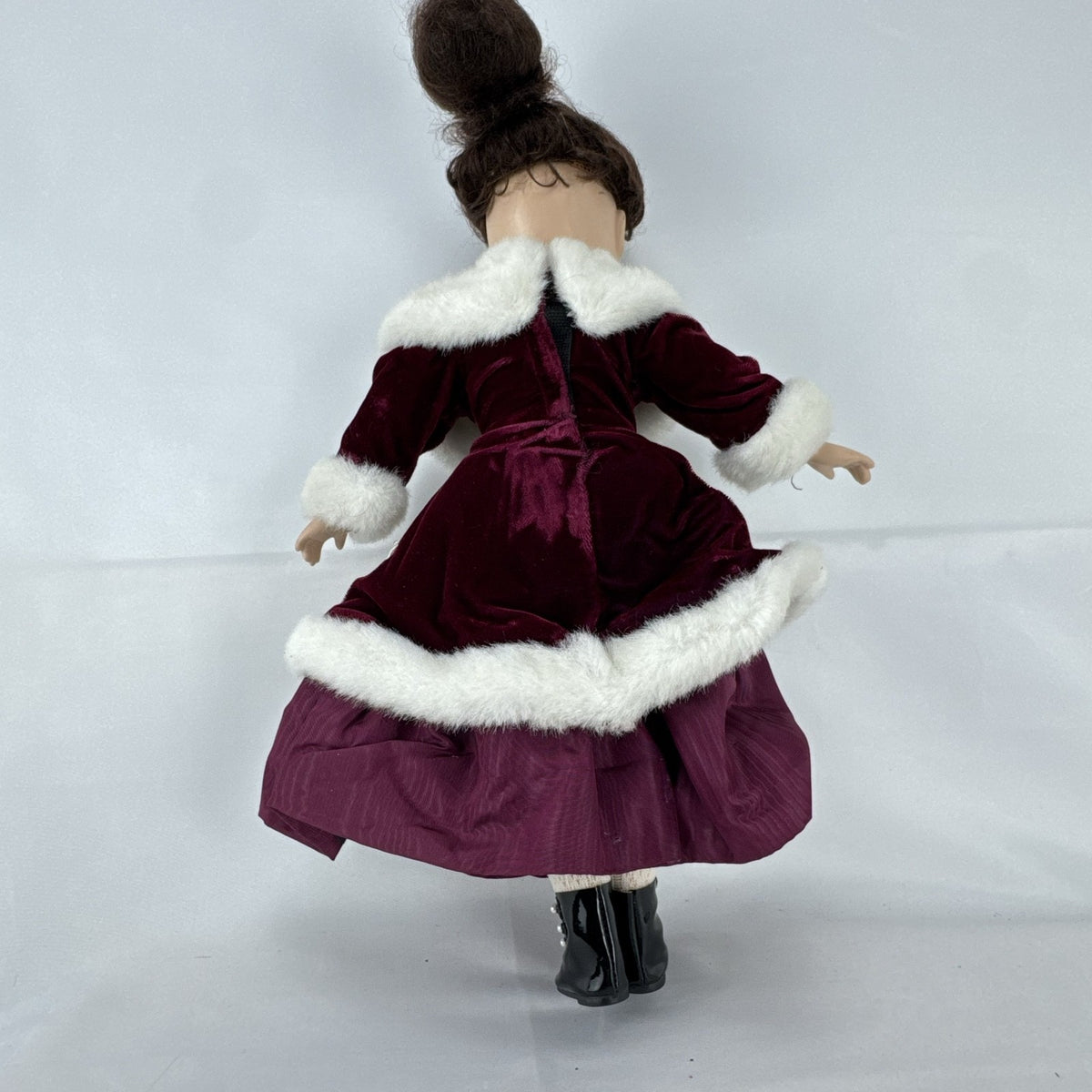The Brass Key 15-inch Victorian porcelain doll in burgundy velvet winter coat with white faux fur trim and muff