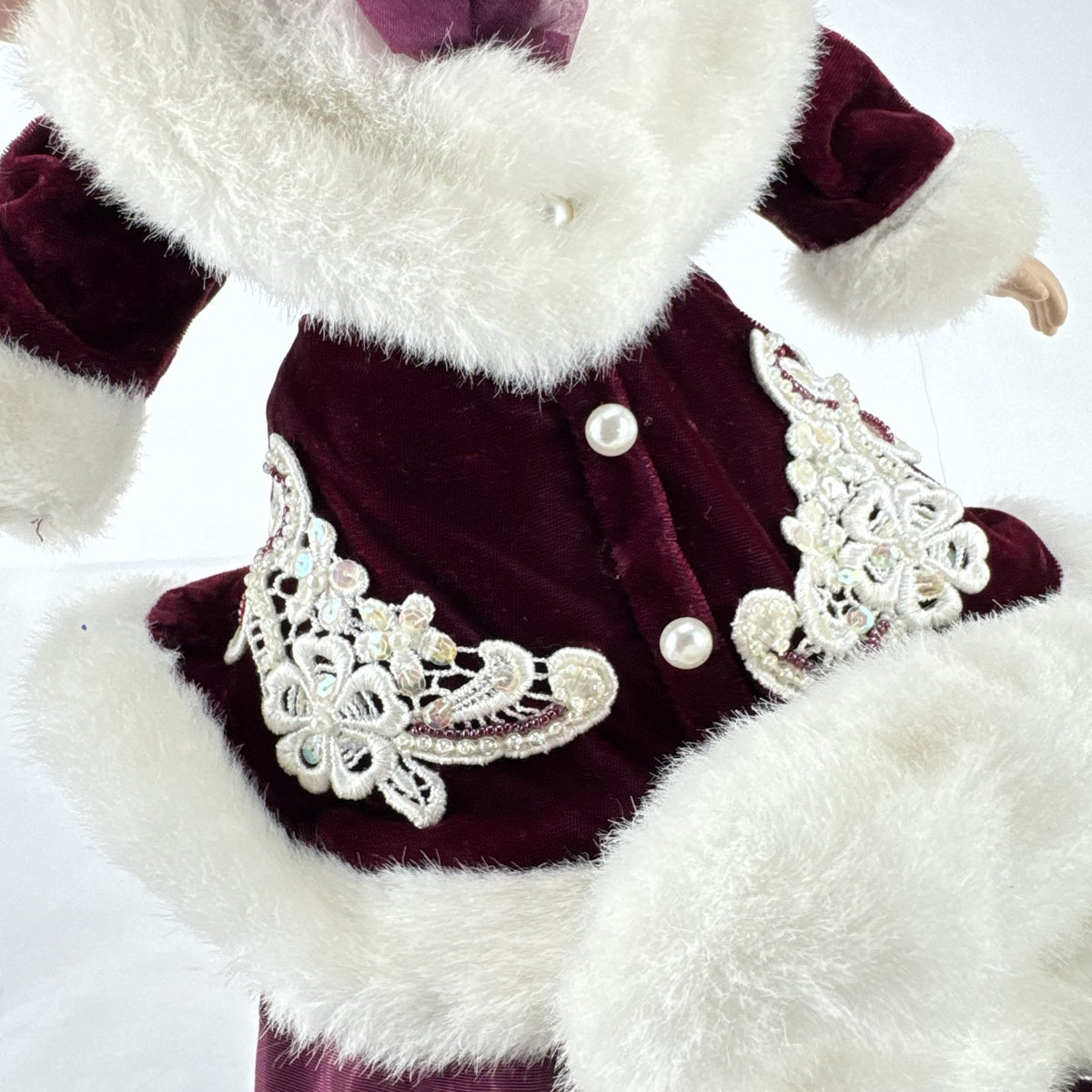The Brass Key 15-inch Victorian porcelain doll in burgundy velvet winter coat with white faux fur trim and muff