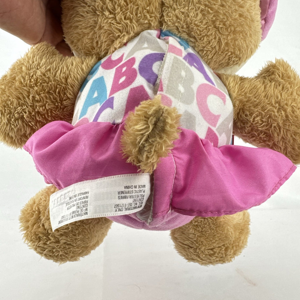Fisher-Price Smart Stages Sis musical puppy plush toy in colorful alphabet dress