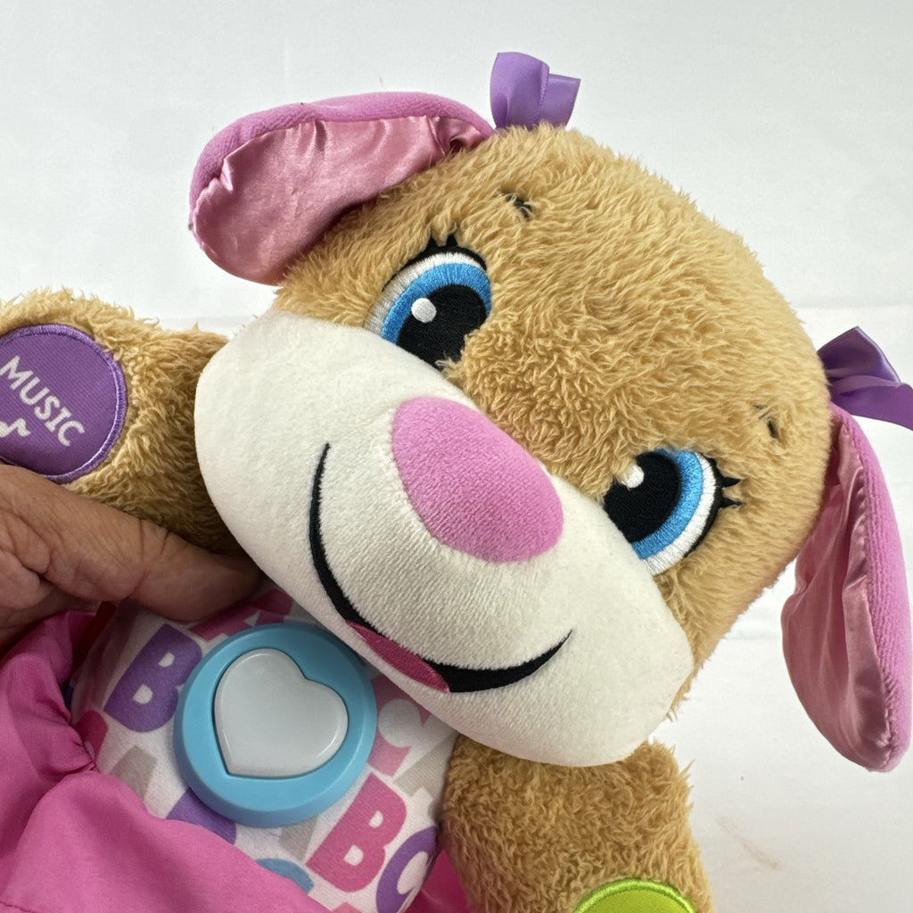 Fisher-Price Smart Stages Sis musical puppy plush toy in colorful alphabet dress