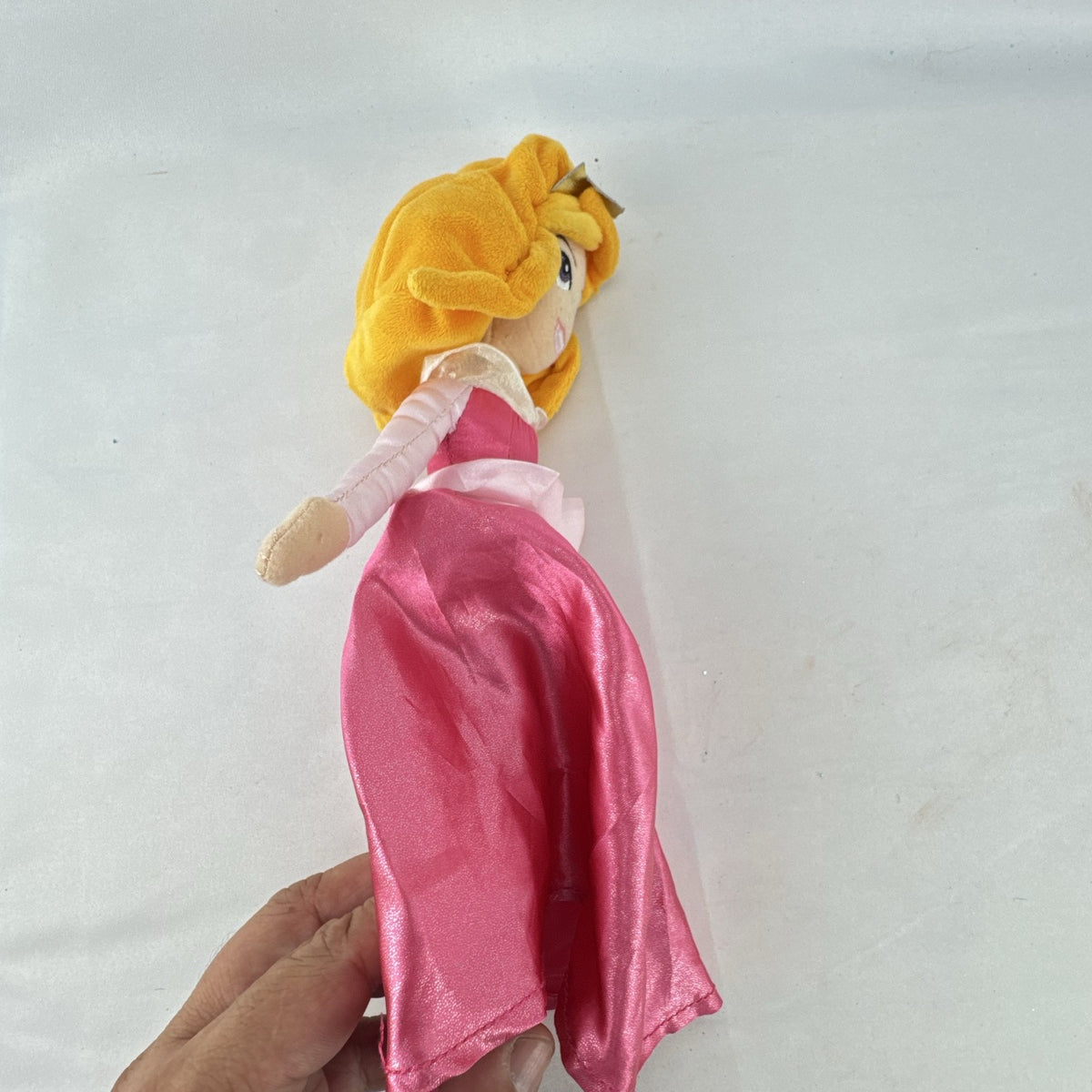 Disney Princess Aurora 10-inch plush doll wearing a pink satin ballgown and golden tiara