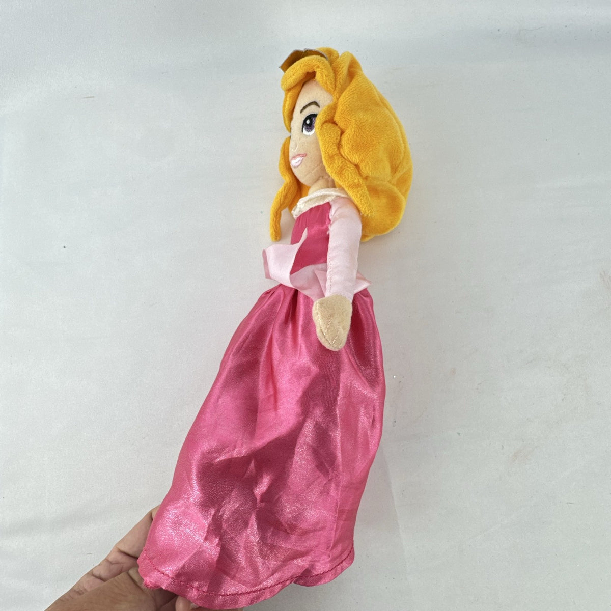 Disney Princess Aurora 10-inch plush doll wearing a pink satin ballgown and golden tiara
