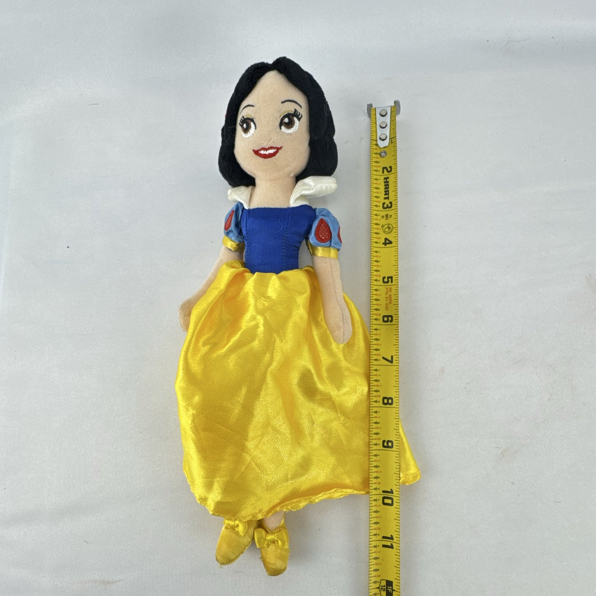Disney Snow White 11-inch plush doll in yellow shimmer satin gown with bow shoes