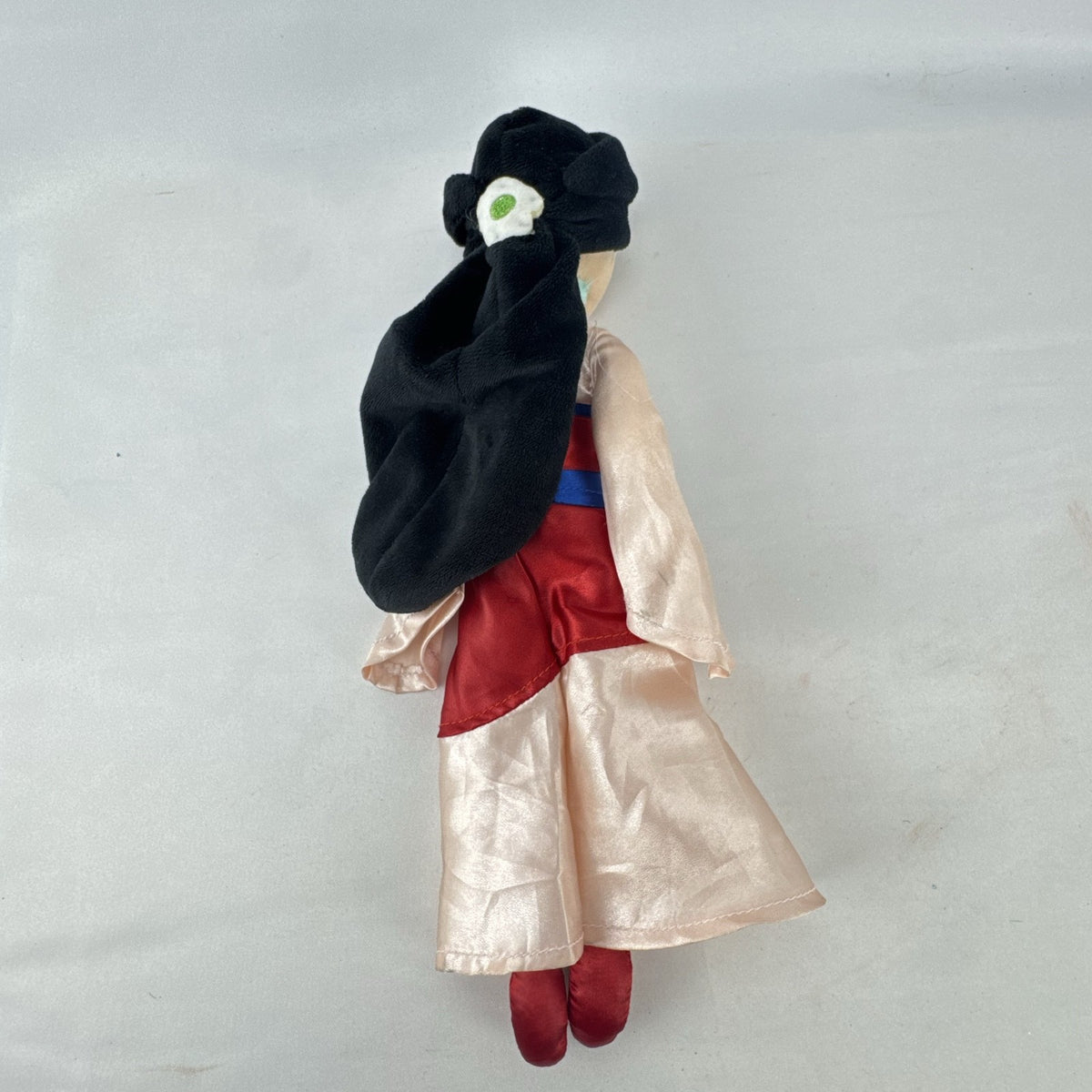 Disney Mulan 12-inch plush doll wearing traditional pink and red satin matchmaker dress