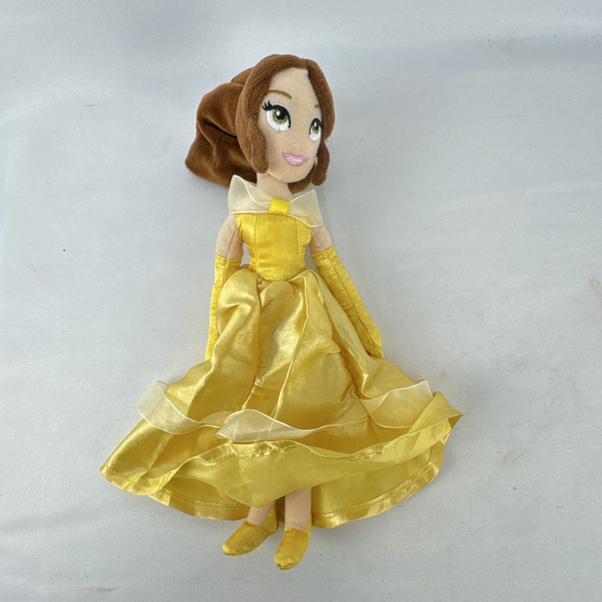 Disney Princess Belle 12-inch plush doll wearing yellow satin ball gown