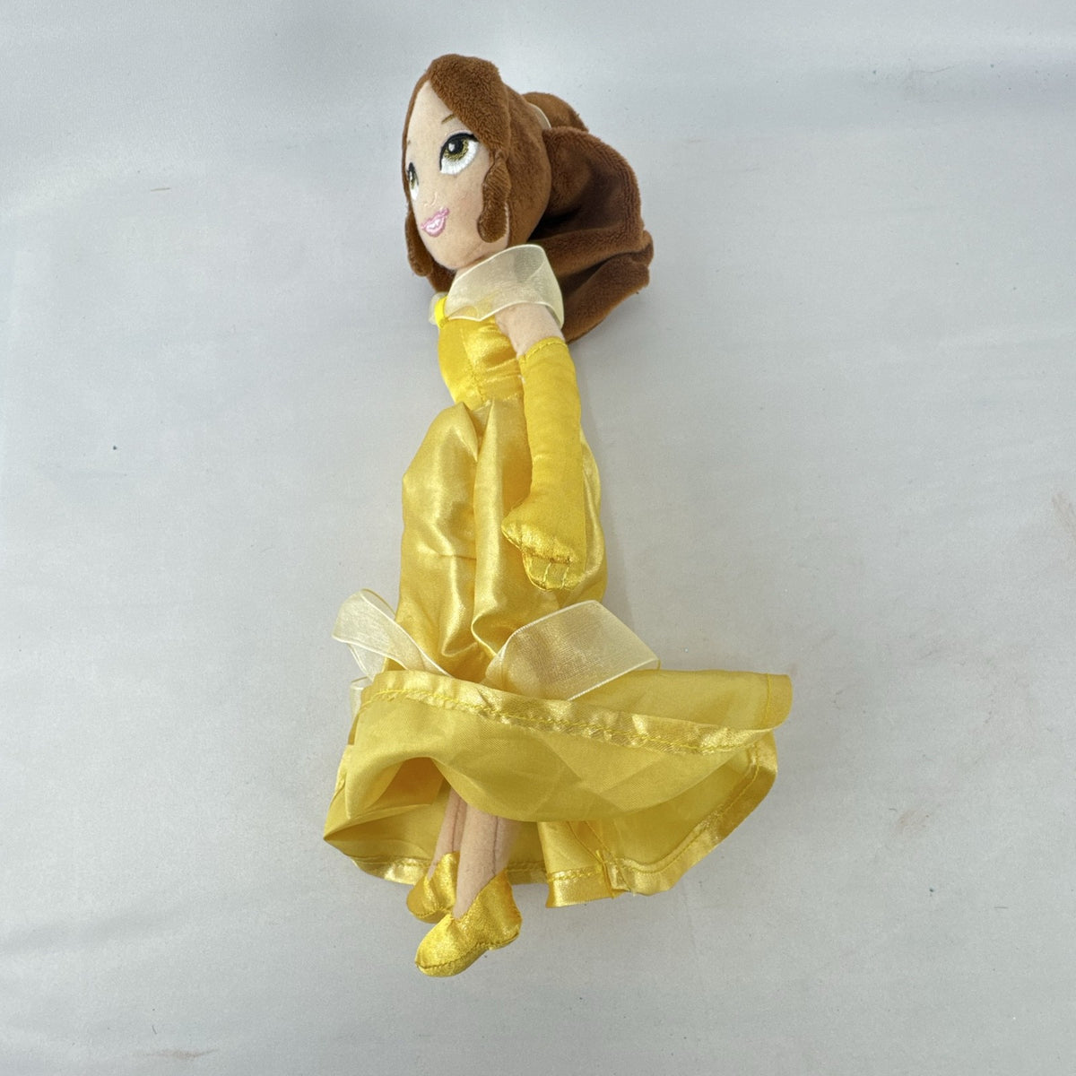 Disney Princess Belle 12-inch plush doll wearing yellow satin ball gown