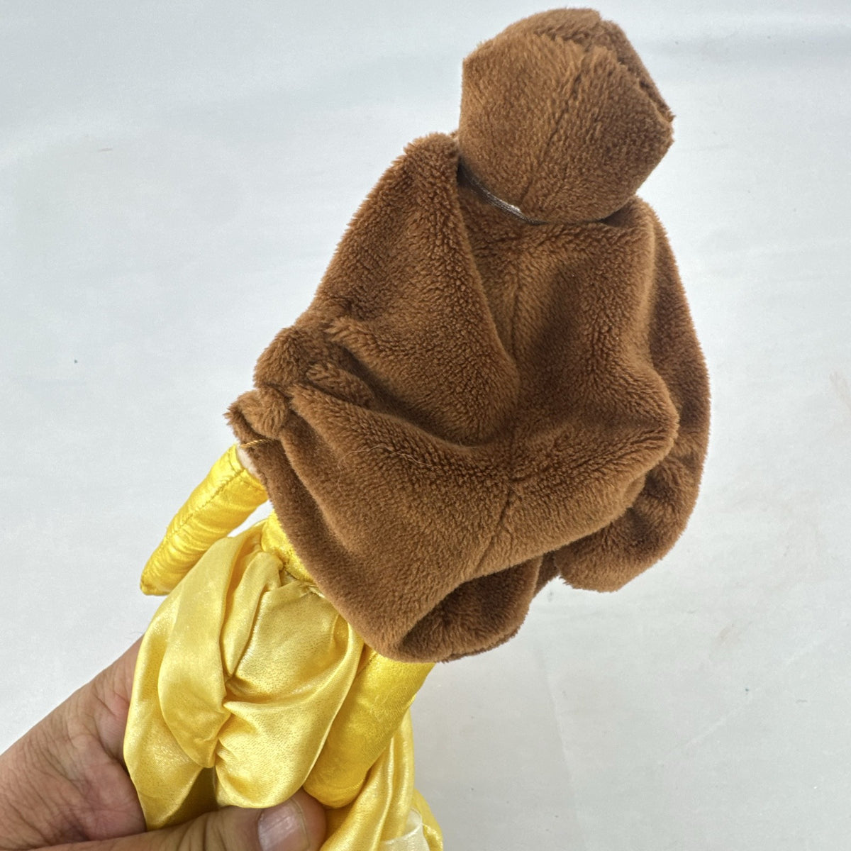 Disney Princess Belle 12-inch plush doll wearing yellow satin ball gown