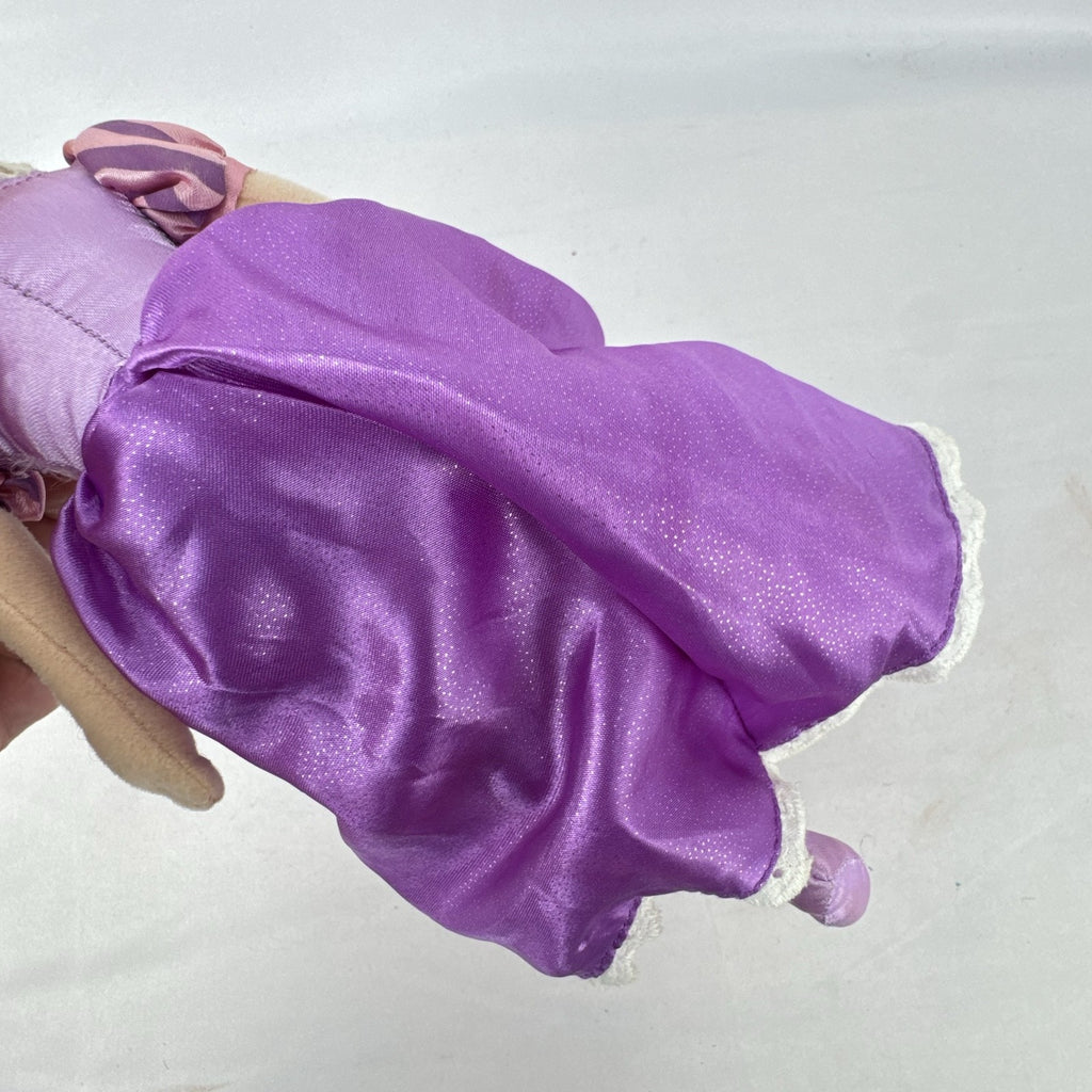 Disney Tangled Rapunzel 11-inch plush doll wearing purple satin dress