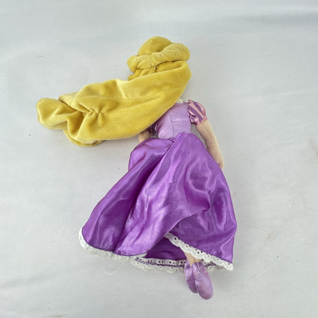 Disney Tangled Rapunzel 11-inch plush doll wearing purple satin dress