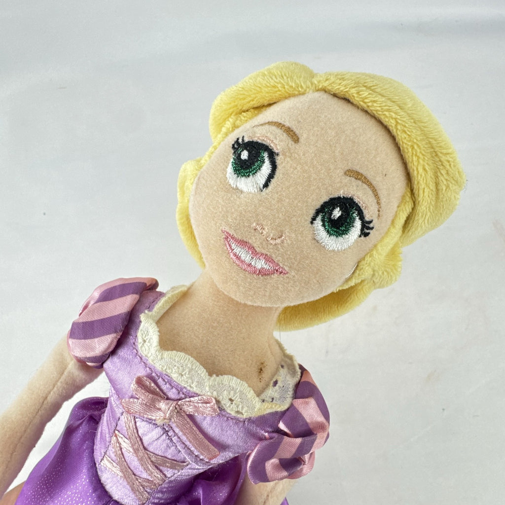 Disney Tangled Rapunzel 11-inch plush doll wearing purple satin dress
