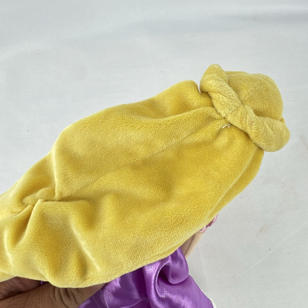 Disney Tangled Rapunzel 11-inch plush doll wearing purple satin dress