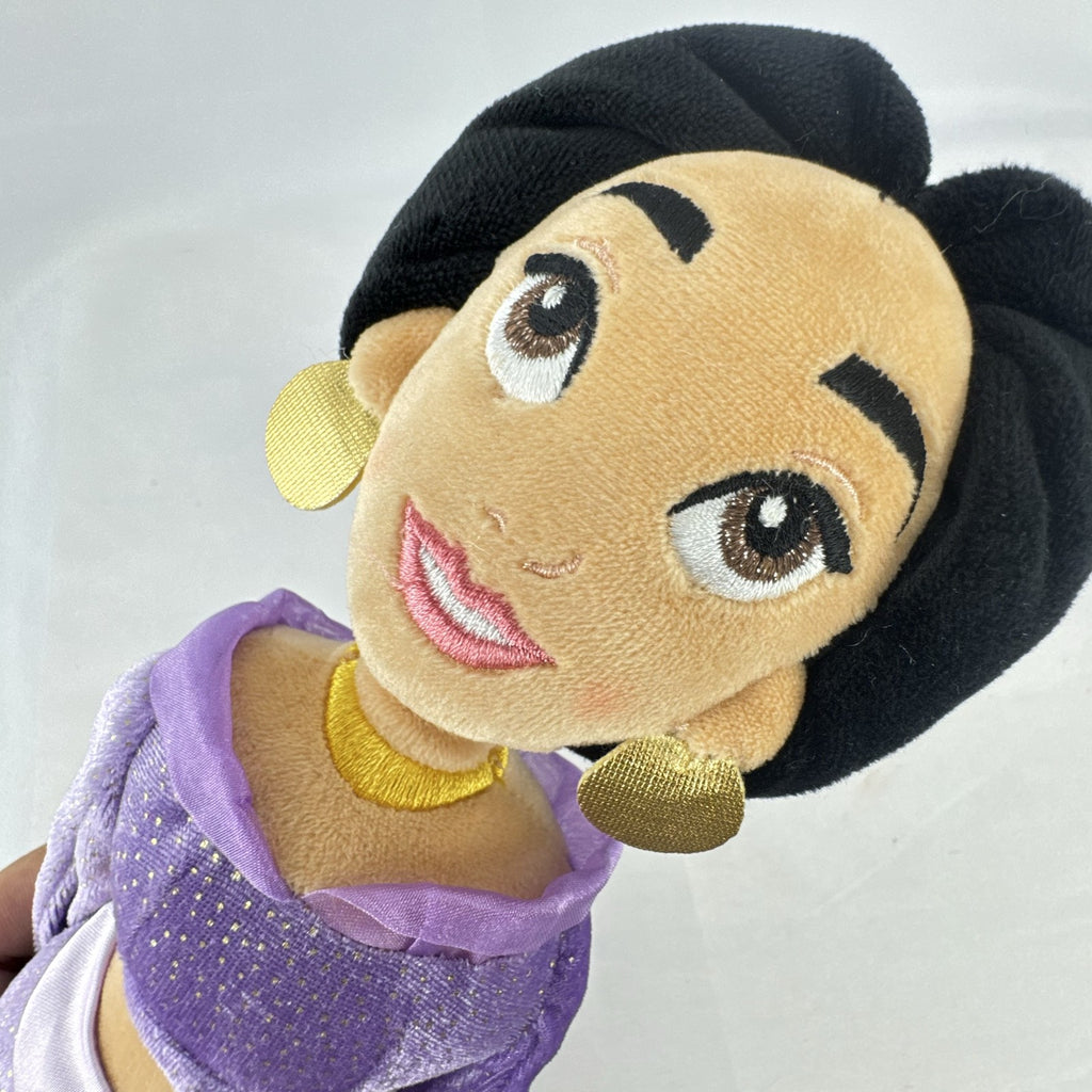 Disney Princess Jasmine 18-inch soft plush doll wearing a sparkling purple outfit and gold fabric accessories.