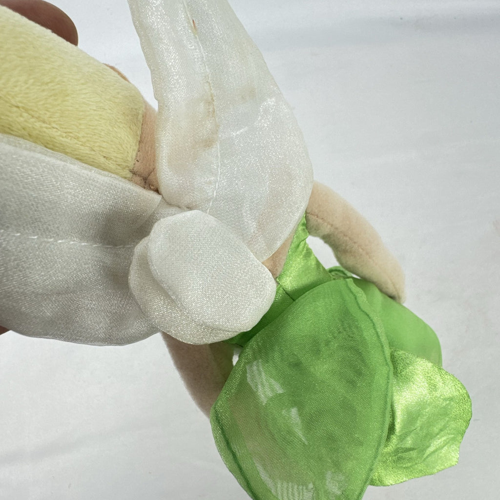 Disney Tinker Bell plush doll with iridescent wings and green petal dress, approximately 11 inches tall.
