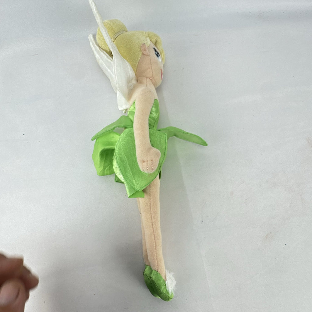 Disney Tinker Bell plush doll with iridescent wings and green petal dress, approximately 11 inches tall.