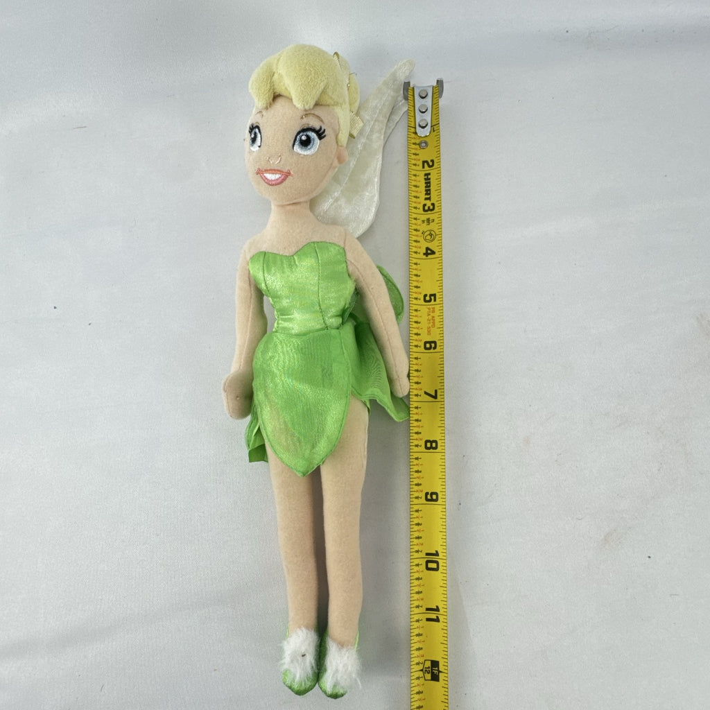 Disney Tinker Bell plush doll with iridescent wings and green petal dress, approximately 11 inches tall.