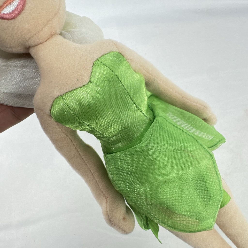 Disney Tinker Bell plush doll with iridescent wings and green petal dress, approximately 11 inches tall.