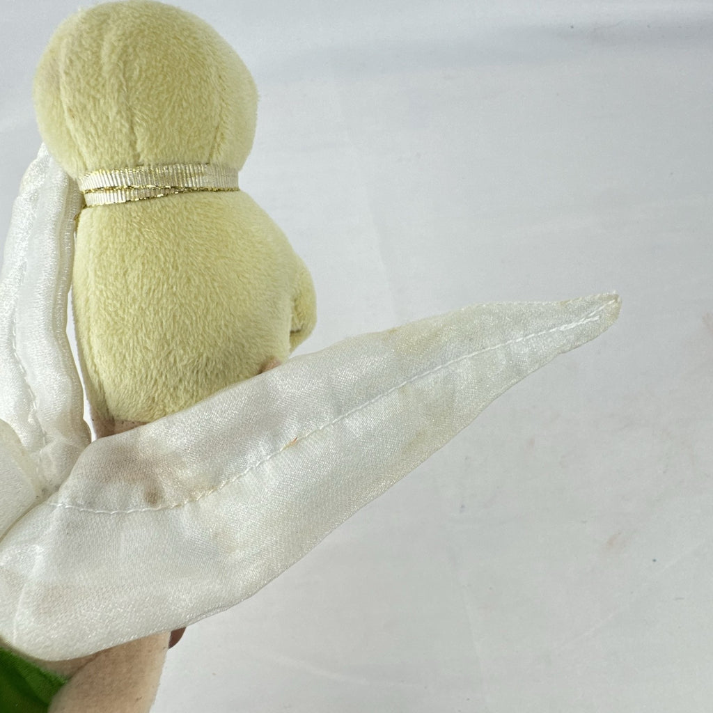 Disney Tinker Bell plush doll with iridescent wings and green petal dress, approximately 11 inches tall.