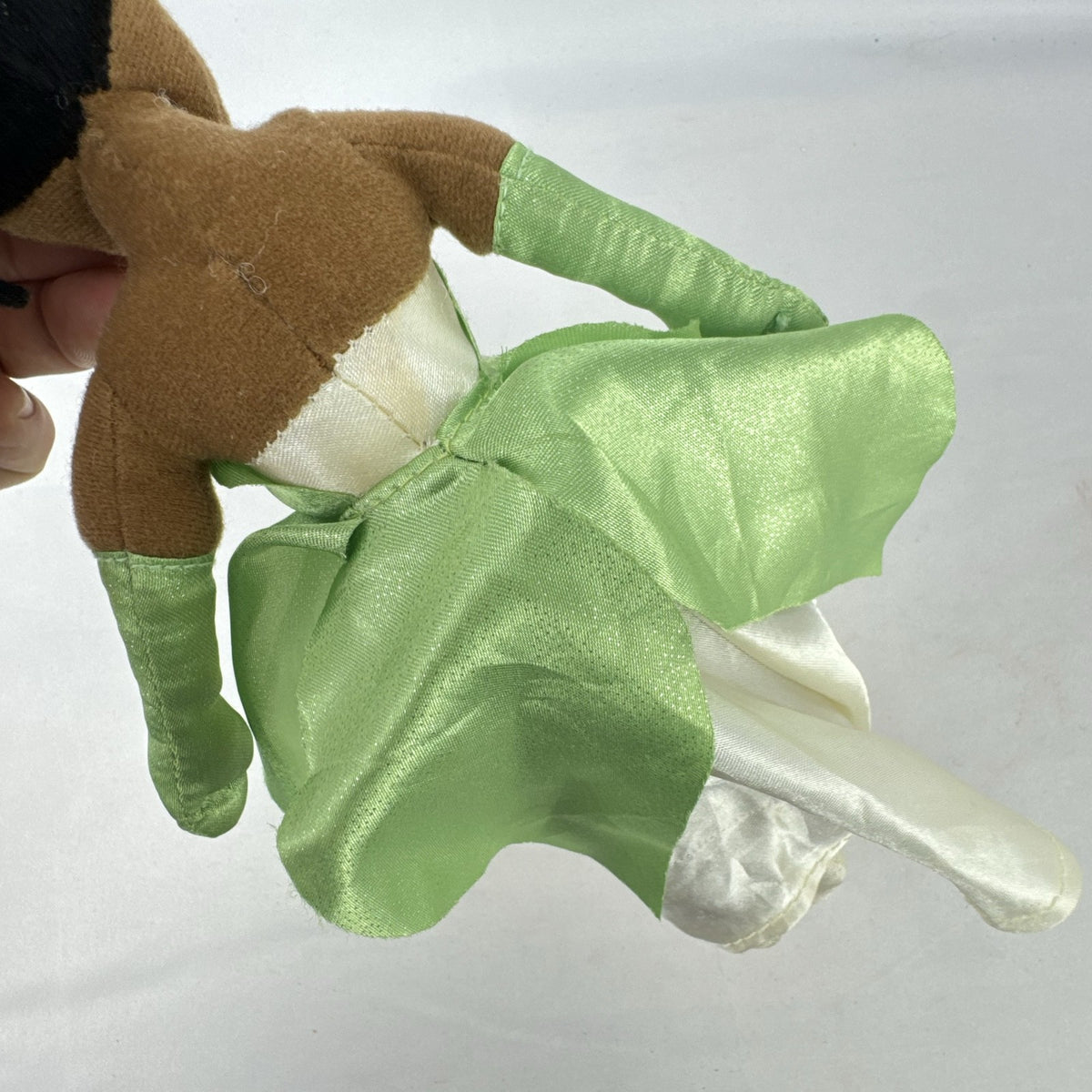 Disney Princess Tiana 11-inch plush doll wearing green satin gown