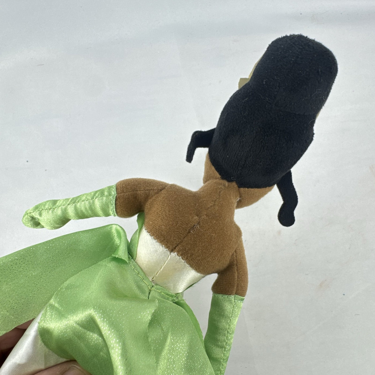 Disney Princess Tiana 11-inch plush doll wearing green satin gown