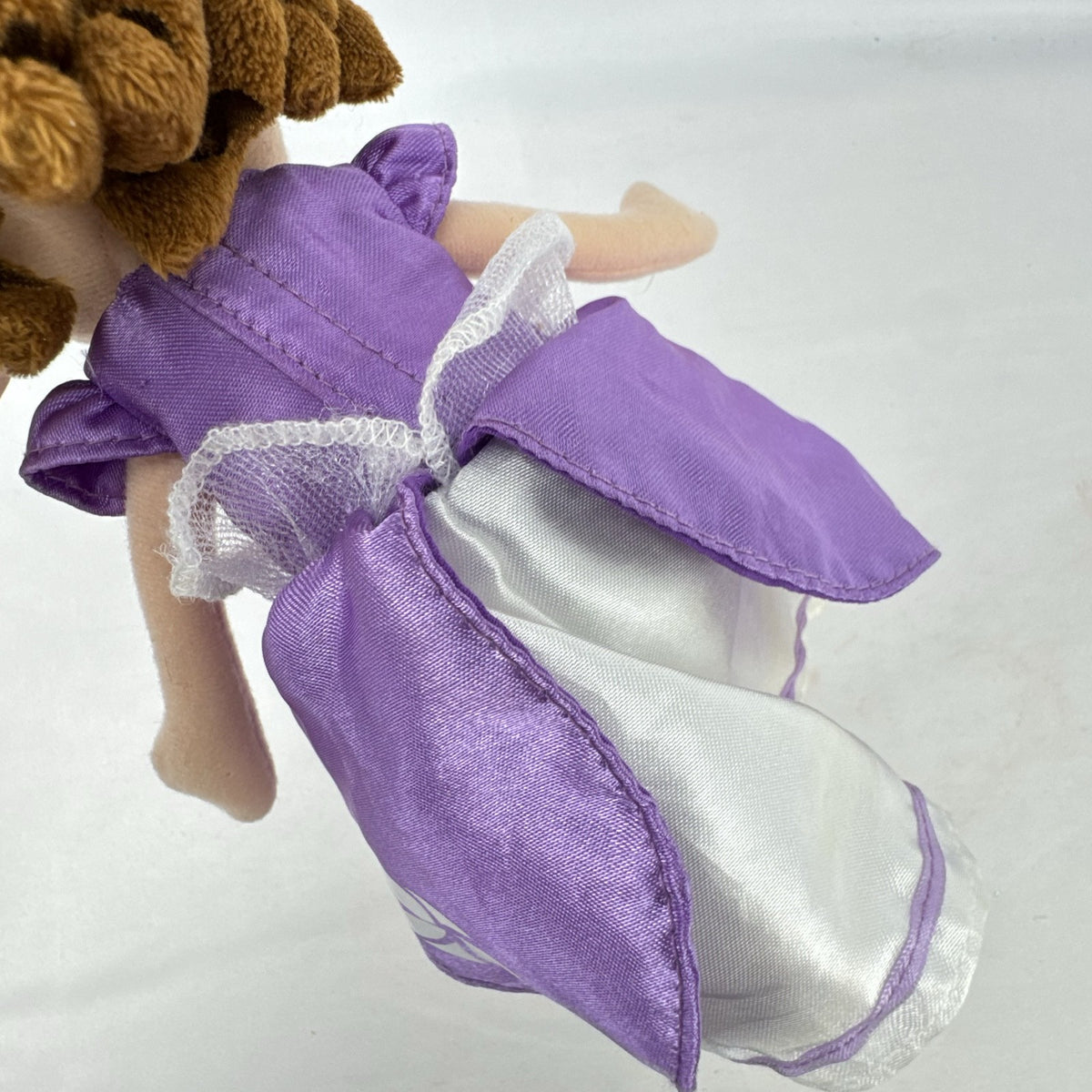 Disney Sofia the First 11-inch plush doll wearing lilac satin dress and silver tiara