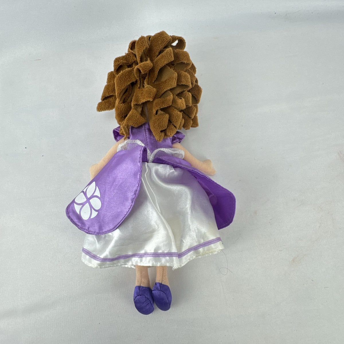 Disney Sofia the First 11-inch plush doll wearing lilac satin dress and silver tiara