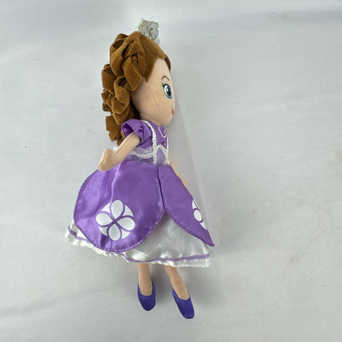 Disney Sofia the First 11-inch plush doll wearing lilac satin dress and silver tiara