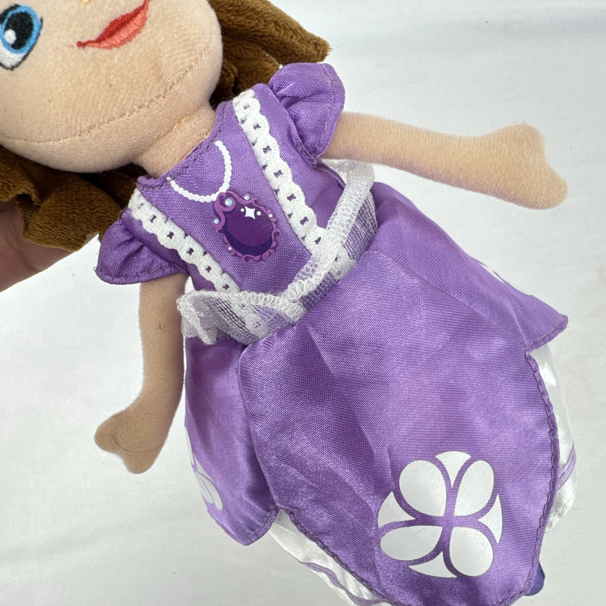 Disney Sofia the First 11-inch plush doll wearing lilac satin dress and silver tiara