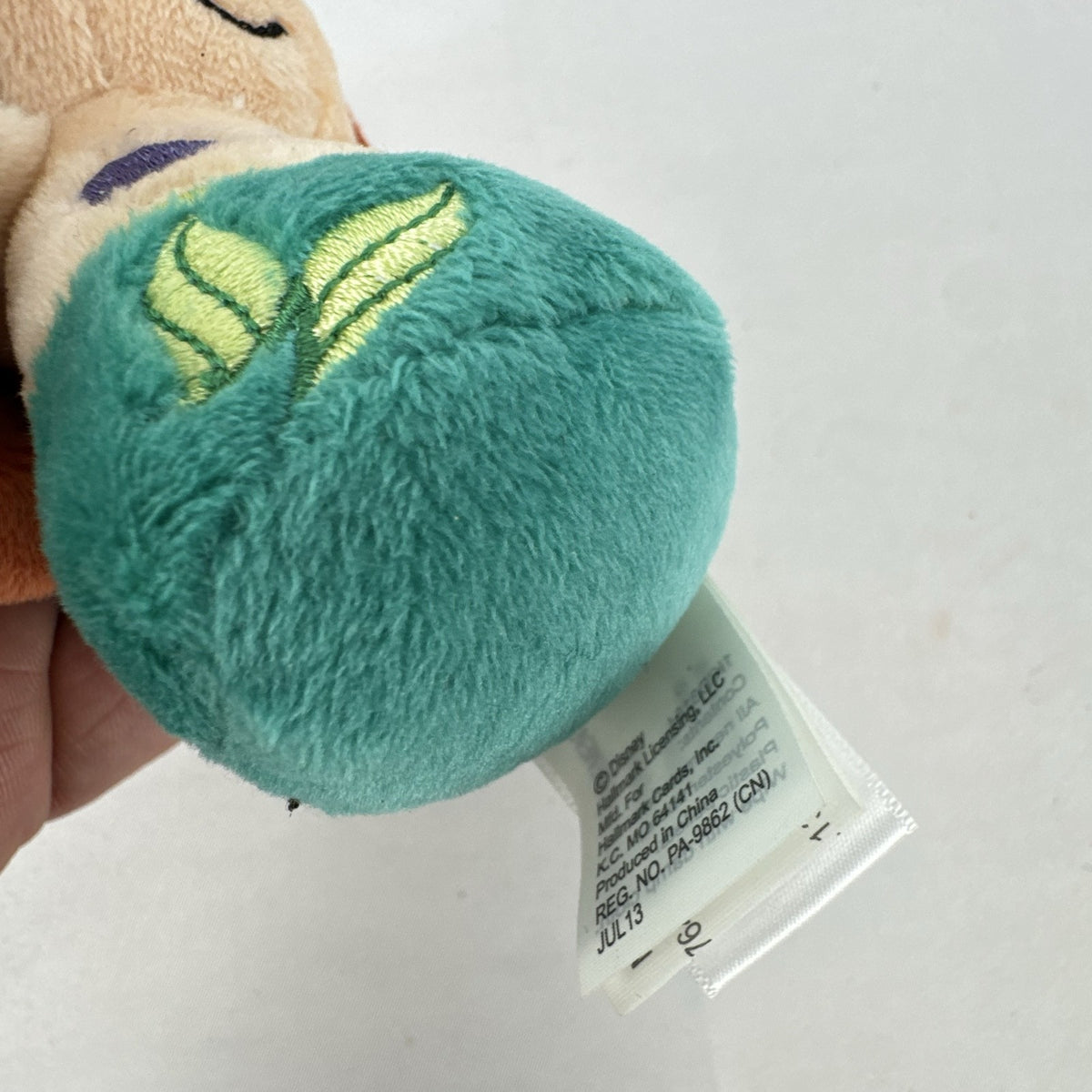 Hallmark itty bittys Ariel mini plush doll with original tags showing green tail and purple top.