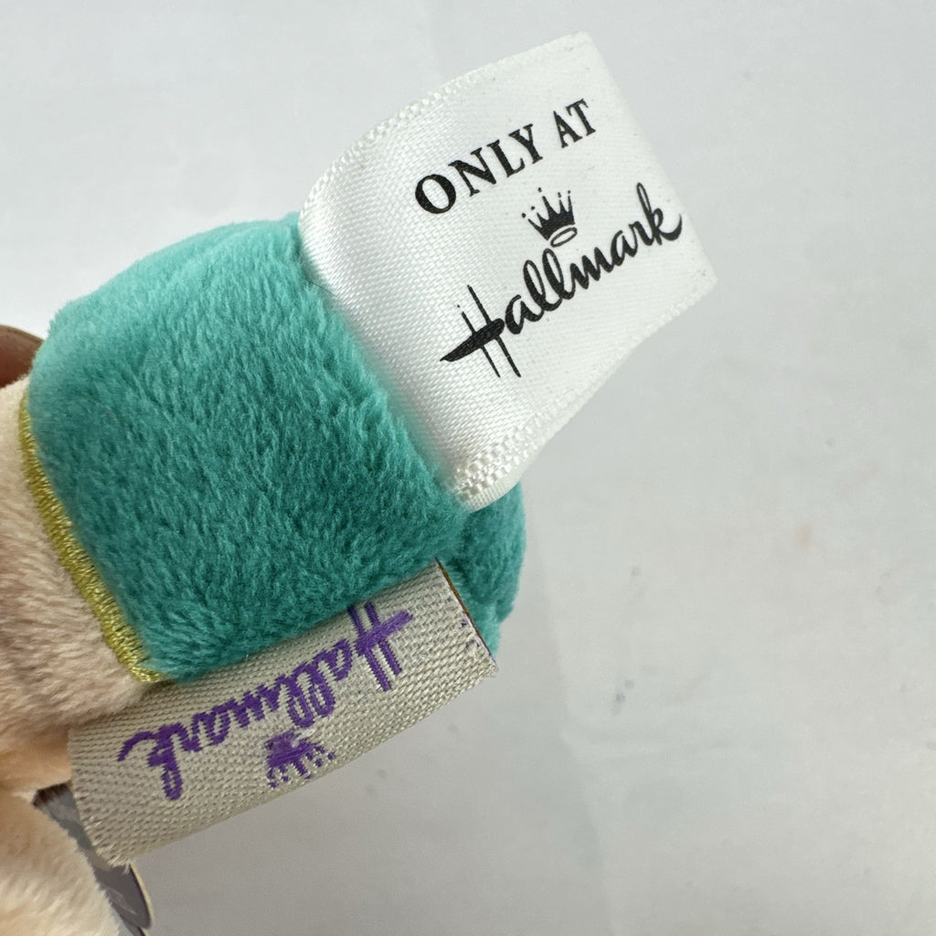 Hallmark itty bittys Ariel mini plush doll with original tags showing green tail and purple top.