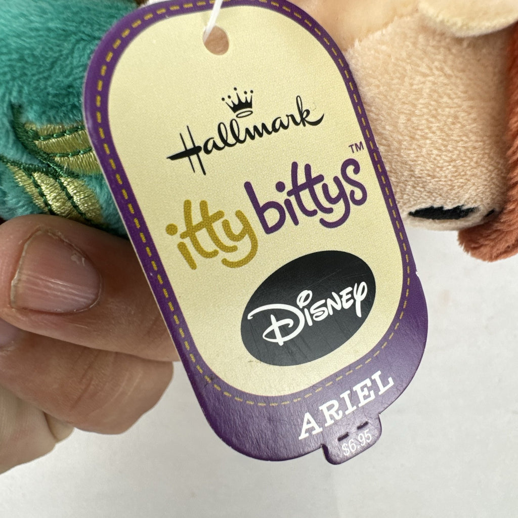 Hallmark itty bittys Ariel mini plush doll with original tags showing green tail and purple top.
