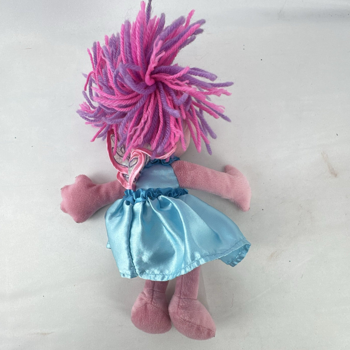 Sesame Street 11-inch Abby Cadabby fairy plush doll wearing blue ruffled dress with wings