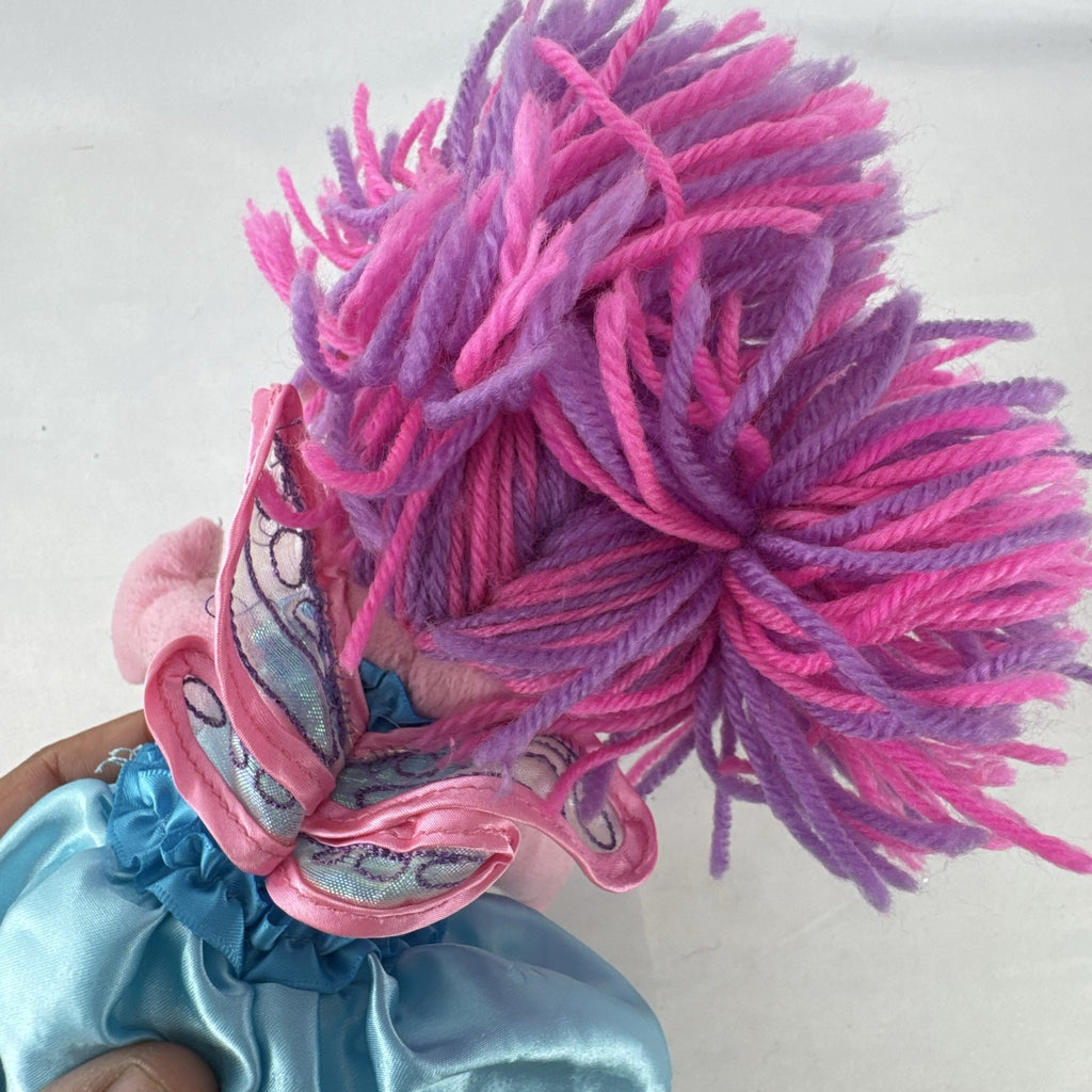 Sesame Street 11-inch Abby Cadabby fairy plush doll wearing blue ruffled dress with wings