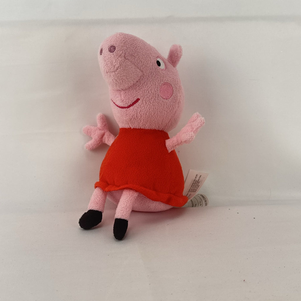Just Play 7-inch Peppa Pig pink plush bean bag doll wearing a red dress